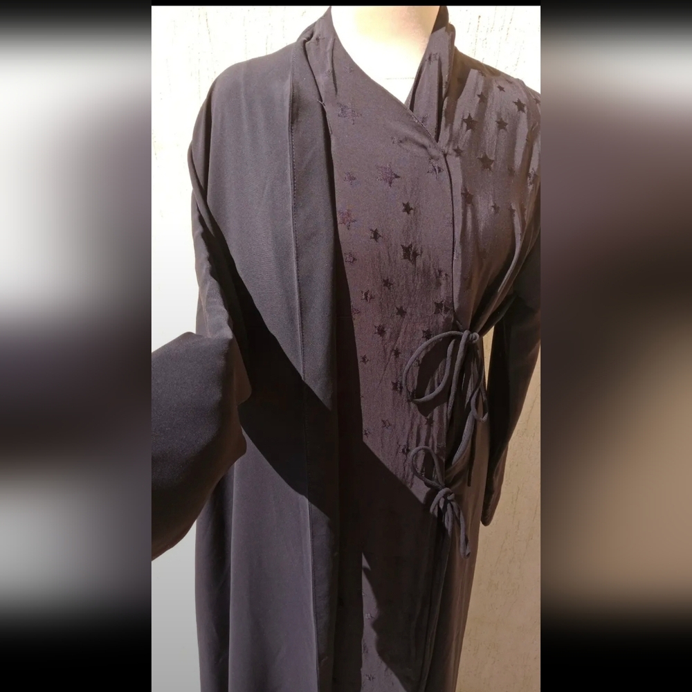 Elegant Black Dress with Colorful Embellishments